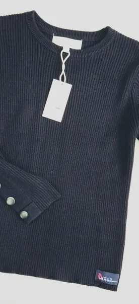 סריג כחול דגם ריב עם לחצנים בשרוול ומאחור